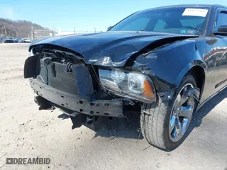 2014 Dodge Charger RT 100th Anniversary with VIN 2C3CDXCT4EH261977, listed as a IAAI auction lot 41815504 with 92,478 mi miles. Bid and sale history available at carsss.com. Image 6.