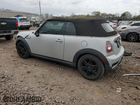 2015 MINI Convertible S with VIN WMWZP3C57F2A91437, listed as a Copart auction lot 53883525 with 28,185 mi miles and Salvage title. Bid and sale history available at DreamBid. Image 2.