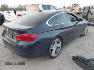 2018 BMW 4 Series 430i with VIN WBA4J1C5XJBG80412, listed as a IAAI auction lot 41788641 with 116,464 mi miles and . Bid and sale history available at carsss.com. Image 4.