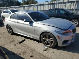 2015 BMW 2 Series M235i with VIN WBA1J7C50FV358435, listed as a Copart auction lot 88021445 with 83,231 mi miles and Salvage Title. Bid and sale history available at carsss.com. Image 4.