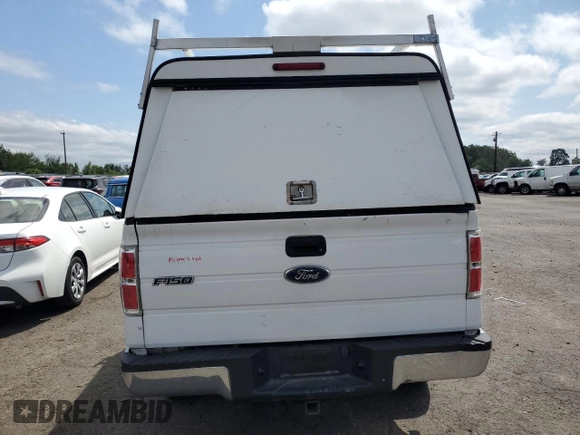 2014 Ford F-150 XL with VIN 1FTFX1ET0EKD17173, listed as a Copart auction lot 59056345 with 185,804 mi miles and Salvage title. Bid and sale history available at DreamBid. Image 6.