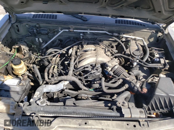2002 Nissan Frontier SE with VIN 1N6ED27T52C383700, listed as a Copart auction lot 86204074 with 216,908 mi miles and Salvage title. Bid and sale history available at DreamBid. Image 11.