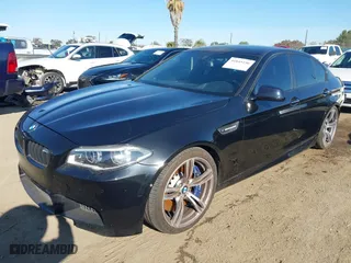 2014 BMW M5 with VIN WBSFV9C56ED097611, listed as a IAAI auction lot 41845196 with 72,215 mi miles. Bid and sale history available at carsss.com. Image 2.