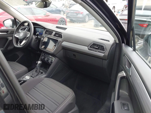 2024 Volkswagen Tiguan S with VIN 3VVRB7AX1RM175360, listed as a IAAI auction lot 42196560 with 5,133 mi miles and . Bid and sale history available at DreamBid. Image 5.