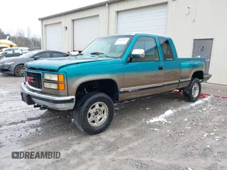 1994 GMC Sierra 1500 with VIN 2GDEK19K2R1549660, listed as a IAAI auction lot 41615642 with 207,399 mi miles and . Bid and sale history available at DreamBid. Image 2.