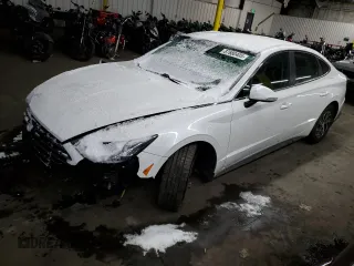 2021 Hyundai Sonata Hybrid Blue with VIN KMHL24JJ4MA021239, listed as a Copart auction lot 87680405 with 106,964 mi miles and Salvage Title. Bid and sale history available at carsss.com. Image 1.