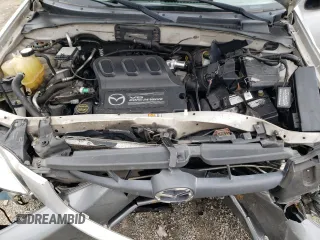 2002 Mazda Tribute LX with VIN 4F2CU08122KM01491, listed as a Copart auction lot 45290265 with 134,141 mi miles and Salvage Title. Bid and sale history available at carsss.com. Image 12.