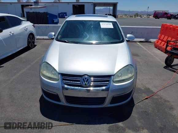 2008 Volkswagen Jetta S with VIN 3VWHM71K58M064797, listed as a IAAI auction lot 42676040 with 211,145 mi miles and . Bid and sale history available at DreamBid. Image 12.