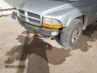 2002 Dodge Dakota z VIN 1B7FL36X42S532446, wystawiony jako IAAI lot #41683398 z przebiegiem 245 626 mil mil oraz . Historia ofert i sprzedaży dostępna na DreamBid. Obrazek 6.