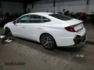 2021 Hyundai Sonata Hybrid Blue with VIN KMHL24JJ4MA021239, listed as a Copart auction lot 87680405 with 106,964 mi miles and Salvage Title. Bid and sale history available at carsss.com. Image 2.