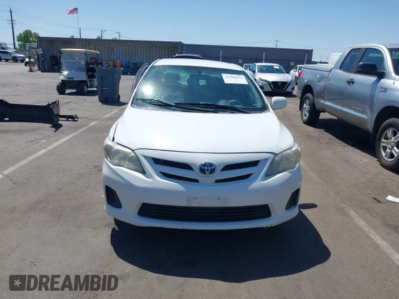 2011 Toyota Corolla L with VIN 2T1BU4EE5BC638097, listed as a IAAI auction lot 42208071 with 238,217 mi miles and . Bid and sale history available at DreamBid. Image 12.