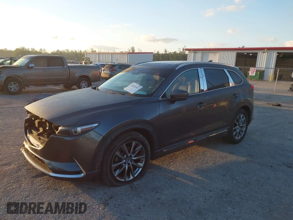 2019 Mazda CX-9 Signature with VIN JM3TCBEY5K0331147, listed as a IAAI auction lot 42026101 with 64,499 mi miles and . Bid and sale history available at DreamBid. Image 2.