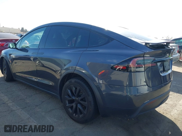 2023 Tesla Model X with VIN 7SAXCBE50PF378548, listed as a IAAI auction lot 41698357 with Not Provided miles and . Bid and sale history available at DreamBid. Image 3.
