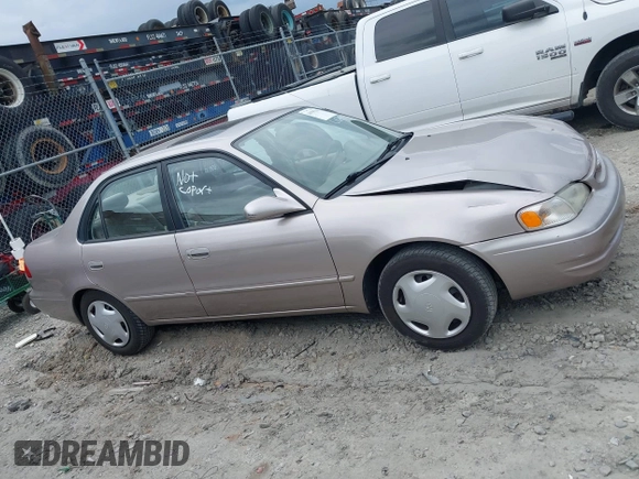 1998 Toyota Corolla VE z VIN 2T1BR18EXWC015480, wystawiony jako IAAI lot #41959316 z przebiegiem 224 304 mil mil oraz . Historia ofert i sprzedaży dostępna na DreamBid. Obrazek 13.