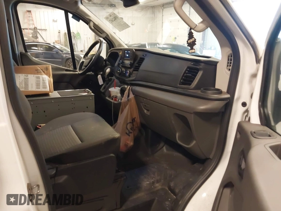 2022 Ford Transit with VIN 1FTBW2Y86NKA06331, listed as a IAAI auction lot 41842602 with 32,869 mi miles and . Bid and sale history available at DreamBid. Image 5.