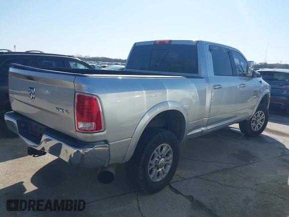 2017 Ram 2500 Laramie with VIN 3C6UR5FL1HG674081, listed as a IAAI auction lot 41783561 with 332,281 mi miles. Bid and sale history available at carsss.com. Image 4.