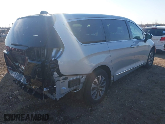 2023 Chrysler Pacifica Hybrid Limited with VIN 2C4RC1S72PR588627, listed as a IAAI auction lot 42063631 with 52,799 mi miles and . Bid and sale history available at DreamBid. Image 4.