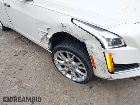 2014 Cadillac CTS Luxury AWD with VIN 1G6AX5S33E0156239, listed as a IAAI auction lot 41452922 with Not Provided miles and . Bid and sale history available at DreamBid. Image 6.