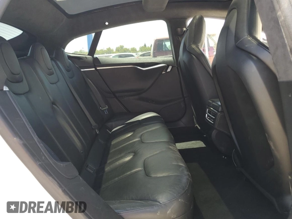 2014 Tesla Model S 60 with VIN 5YJSA1H19EFP58677, listed as a Copart auction lot 61446345 with 150,152 mi miles and Salvage title. Bid and sale history available at DreamBid. Image 10.