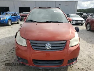 2013 Suzuki SX4 with VIN JS2YB5A42D6100038, listed as a Copart auction lot 73148344 with 141,675 mi miles and Salvage Title. Bid and sale history available at DreamBid. Image 5.