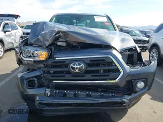 2018 Toyota Tacoma SR with VIN 5TFRX5GN8JX116802, listed as a IAAI auction lot 41879503 with 86,448 mi miles and . Bid and sale history available at DreamBid. Image 13.