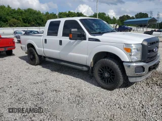 2014 Ford F-250 XL with VIN 1FT7W2B69EEB09366, listed as a Copart auction lot 60901435 with 155,083 mi miles and Salvage title. Bid and sale history available at DreamBid. Image 4.