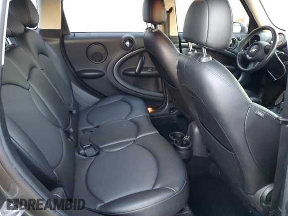 2014 MINI Countryman S with VIN WMWZC3C59EWP29137, listed as a Copart auction lot 79721804 with 124,871 mi miles and Salvage title. Bid and sale history available at DreamBid. Image 11.