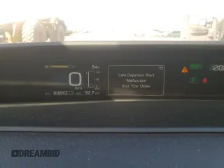 2020 Toyota Prius LE z VIN JTDKARFP4L3124967, wystawiony jako Copart lot #85278224 z przebiegiem 80 842 mil mil oraz Szkoda całkowita • Salvage title. Historia ofert i sprzedaży dostępna na DreamBid. Obrazek 9.