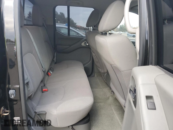 2015 Nissan Frontier SV with VIN 1N6AD0FR4FN711157, listed as a Copart auction lot 76598584 with 82,311 mi miles and Salvage title. Bid and sale history available at DreamBid. Image 10.