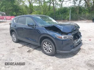 2023 Mazda CX-5 S Carbon Edition z VIN JM3KFBCM0P0133330, wystawiony jako IAAI lot #42132796 z przebiegiem Nie podano mil oraz . Historia ofert i sprzedaży dostępna na DreamBid. Obrazek 1.