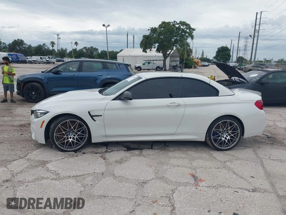 2018 BMW M4 with VIN WBS4Z9C5XJED22650, listed as a IAAI auction lot 42631888 with 41,266 mi miles and . Bid and sale history available at DreamBid. Image 14.