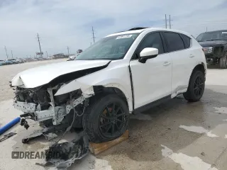 2017 Mazda CX-5 Grand Touring with VIN JM3KFBDL8H0209075, listed as a Copart auction lot 47991735 with 209,743 mi miles and Salvage Title. Bid and sale history available at carsss.com. Image 1.