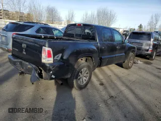 2008 Mitsubishi Raider LS with VIN 1Z7HT28K98S610107, listed as a Copart auction lot 43943935 with 215,482 mi miles and Salvage Title. Bid and sale history available at carsss.com. Image 3.
