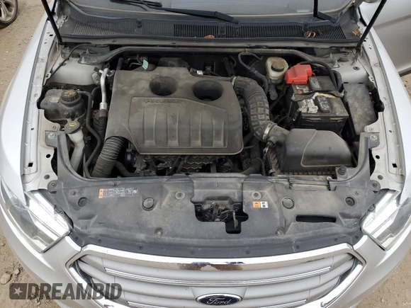 2016 Ford Taurus SEL with VIN 1FAHP2E9XGG144955, listed as a Copart auction lot 82207634 with 128,823 mi miles and Salvage Title. Bid and sale history available at DreamBid. Image 11.