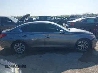2014 Infiniti Q50 Hybrid Premium with VIN JN1AV7AP4EM691014, listed as a IAAI auction lot 41984130 with 114,230 mi miles and . Bid and sale history available at DreamBid. Image 13.