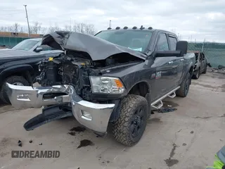 2015 Ram 2500 SLT with VIN 3C6TR5DTXFG611461, listed as a IAAI auction lot 41730420 with 163,581 mi miles. Bid and sale history available at carsss.com. Image 2.