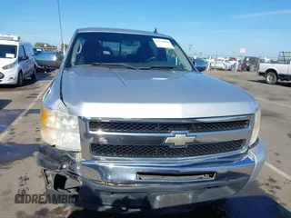2010 Chevrolet Silverado 1500 LT with VIN 3GCRCSE02AG163989, listed as a IAAI auction lot 42111090 with 158,921 mi miles and . Bid and sale history available at DreamBid. Image 13.
