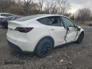 2023 Tesla Model Y Long Range with VIN 7SAYGDEE0PF746778, listed as a Copart auction lot 52704965 with 19,047 mi miles and Salvage Title. Bid and sale history available at DreamBid. Image 3.