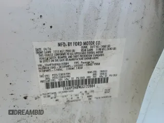 2016 Ford Taurus SEL with VIN 1FAHP2H89GG122884, listed as a Copart auction lot 53597595 with 128,627 mi miles and Salvage title. Bid and sale history available at DreamBid. Image 12.