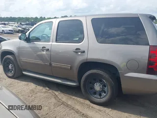 2012 Chevrolet Tahoe Commercial with VIN 1GNLC2E07CR187432, listed as a IAAI auction lot 42126539 with 169,607 mi miles and . Bid and sale history available at DreamBid. Image 14.