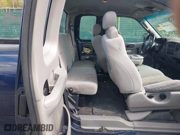 2003 Ford F-150 XL with VIN 1FTRX17223NB22897, listed as a IAAI auction lot 42166965 with 207,627 mi miles and . Bid and sale history available at DreamBid. Image 8.