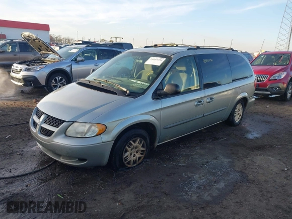 2003 Dodge Grand Caravan with VIN 2D4GP443X3R277421, listed as a IAAI auction lot 41035290 with 243,568 mi miles and . Bid and sale history available at DreamBid. Image 2.