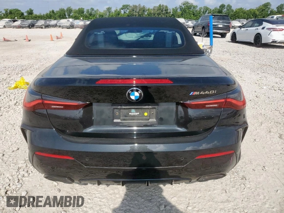 2023 BMW 4 Series M440i with VIN WBA53AT06PCM44083, listed as a Copart auction lot 58314465 with Not provided miles and Salvage title. Bid and sale history available at DreamBid. Image 6.