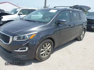 2020 Kia Sedona EX with VIN KNDMB5C14L6596843, listed as a IAAI auction lot 42074858 with 82,294 mi miles. Bid and sale history available at carsss.com. Image 2.