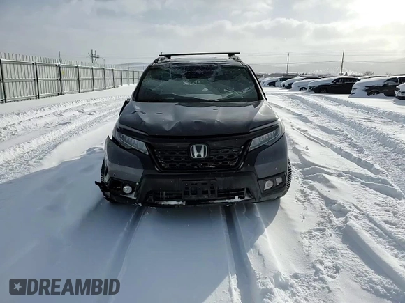 2021 Honda Passport Elite z VIN 5FNYF8H05MB021597, wystawiony jako Copart lot #44463515 z przebiegiem Nie podano mil oraz Szkoda całkowita • Salvage title. Historia ofert i sprzedaży dostępna na DreamBid. Obrazek 12.