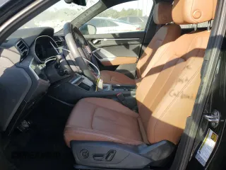 2022 Audi Q3 Premium with VIN WA1AUCF32N1001495, listed as a Copart auction lot 83381104 with 24,682 mi miles and Salvage Title. Bid and sale history available at carsss.com. Image 7.