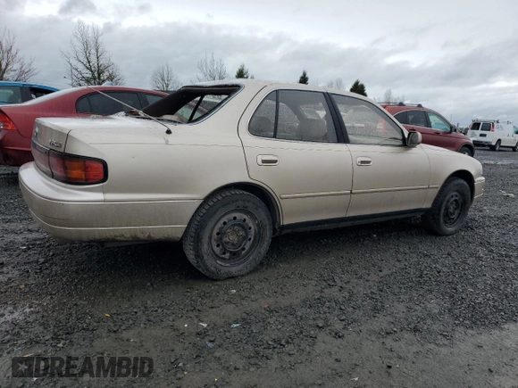 1994 Toyota Camry XLE with VIN JT2GK13E4R0053523, listed as a Copart auction lot 46646995 with 172,091 mi miles and Salvage Title. Bid and sale history available at carsss.com. Image 3.