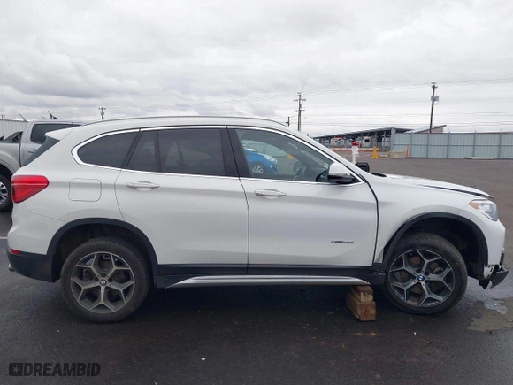 2018 BMW X1 sDrive28i with VIN WBXHU7C32J5H44246, listed as a IAAI auction lot 41477050 with 69,858 mi miles. Bid and sale history available at carsss.com. Image 13.