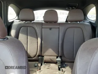 2017 BMW X1 xDrive28i with VIN WBXHT3Z31H4A57021, listed as a Copart auction lot 46507885 with 165,071 mi miles and Salvage Title. Bid and sale history available at carsss.com. Image 10.