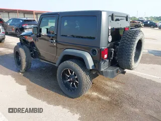2017 Jeep Wrangler Sport with VIN 1C4AJWAG6HL654592, listed as a IAAI auction lot 42447379 with 61,585 mi miles and . Bid and sale history available at DreamBid. Image 3.